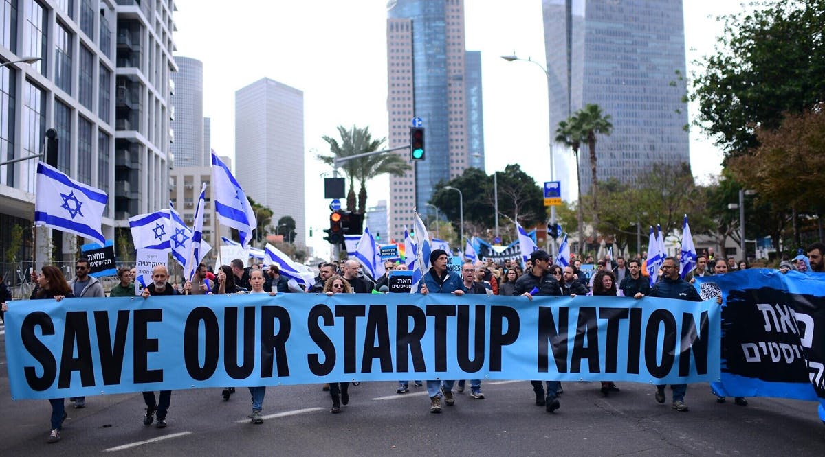 Tech workers march in Tel Aviv to protest against the government's planned overhaul of the judicial system