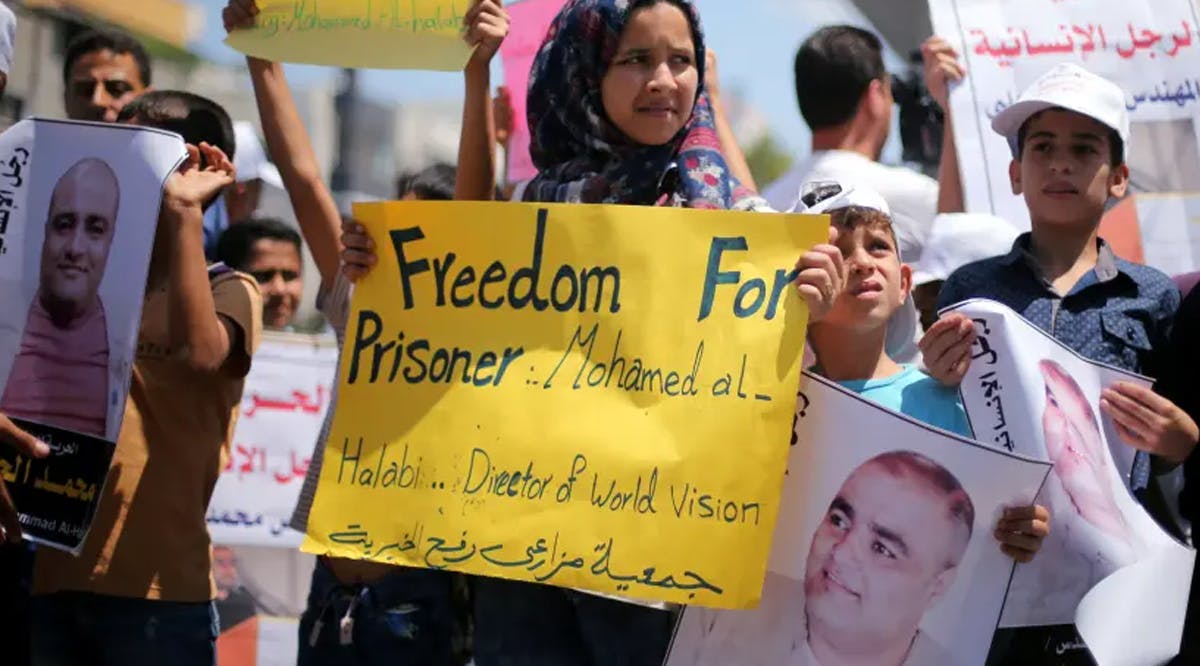 Palestinian demonstrators take part in a protest in solidarity with Mohammad El Halabi