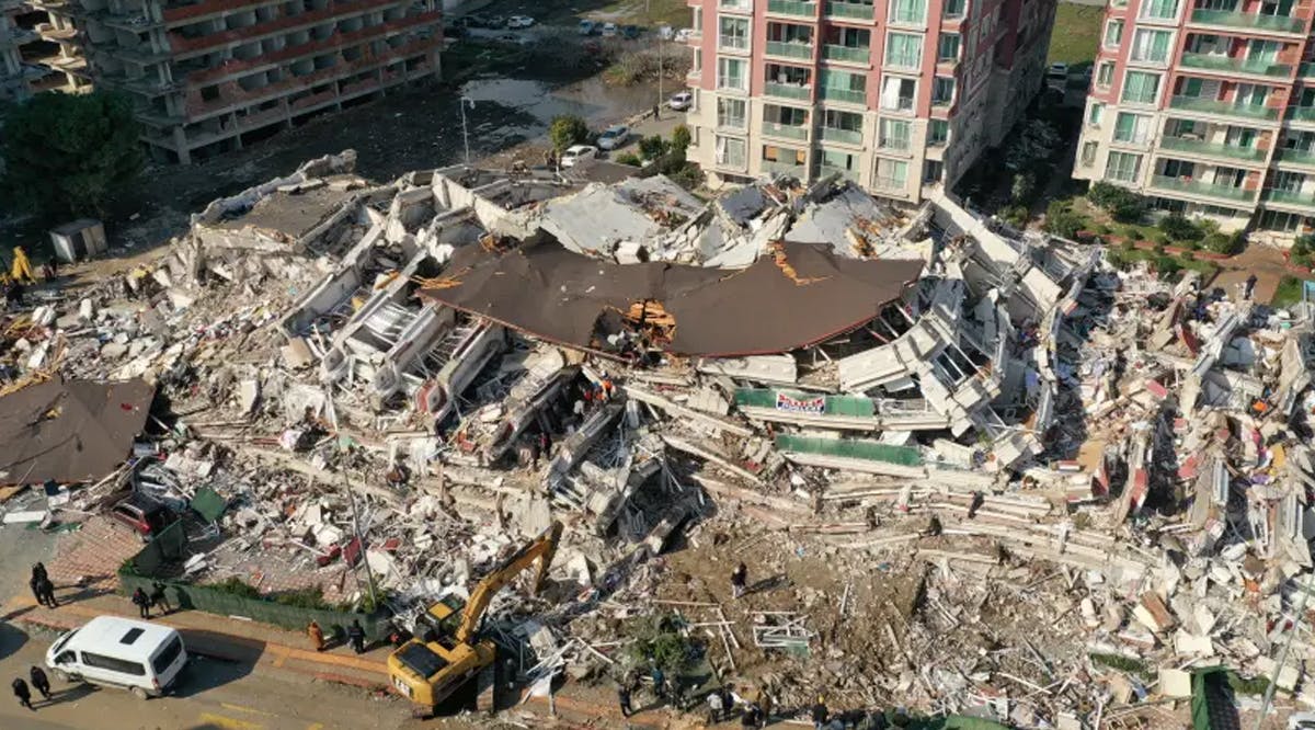 An aerial view shows collapsed and damaged buildings after an earthquake in Hatay, Turkey