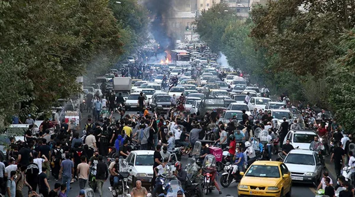 Protesters jam a street in downtown Tehran, Iran