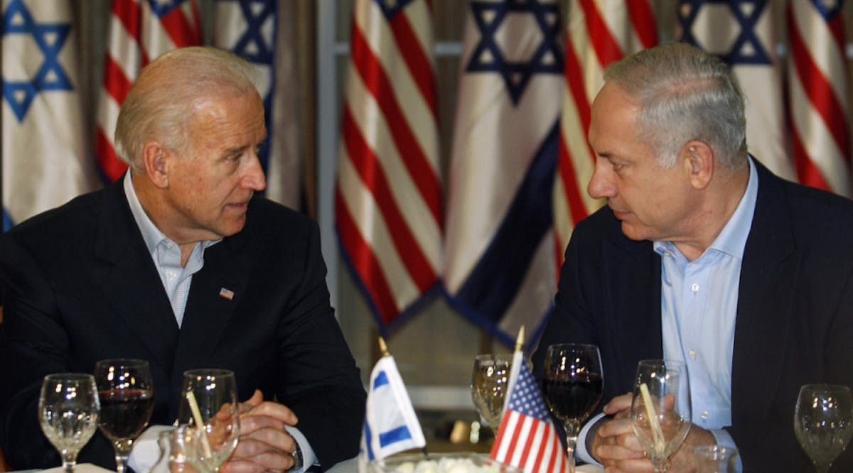Joe Biden sits with Israel's Prime Minister Benjamin Netanyahu