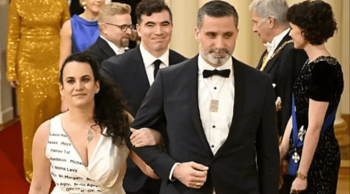 The President of the Jewish Community of Finland Yaron Nadbornik wore a #bringthemhomenow necklace, while his wife, Galith’s, dress featured the names of the hostages