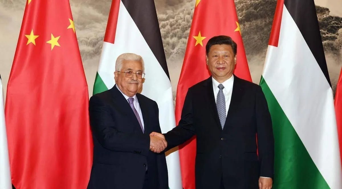 Palestinian President Mahmoud Abbas (L) shakes hands with President of China Xi Jinping (R) in Beijing, China