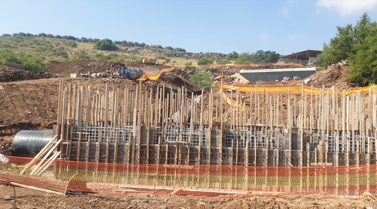 Work goes on to lay a pipe that will channel desalinated water to the Sea of Galilee