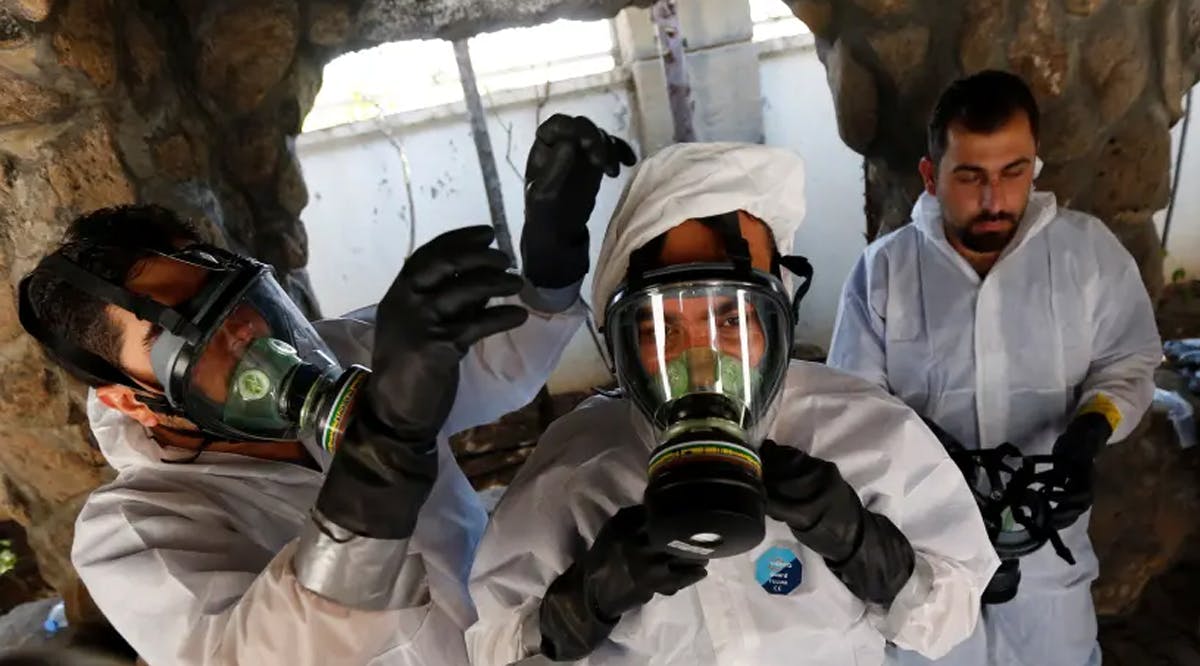 Syrian medical staff take part in a training exercise to learn how to treat victims of chemical weapons attacks