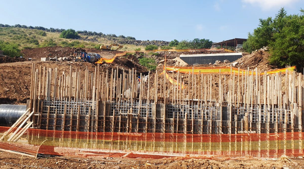 Work goes on to lay a pipe that will channel desalinated water to the Sea of Galilee