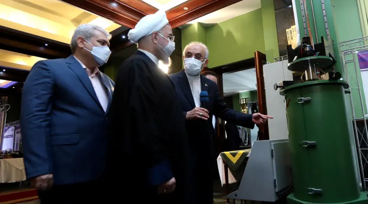 Iranian President Hassan Rouhani reviews Iran's new nuclear achievements
