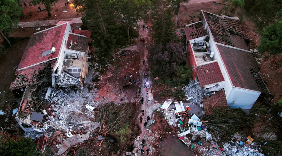 An aerial view shows damage caused following a mass infiltration by Hamas gunmen from the Gaza Strip, in Kibbutz Beeri in southern Israel