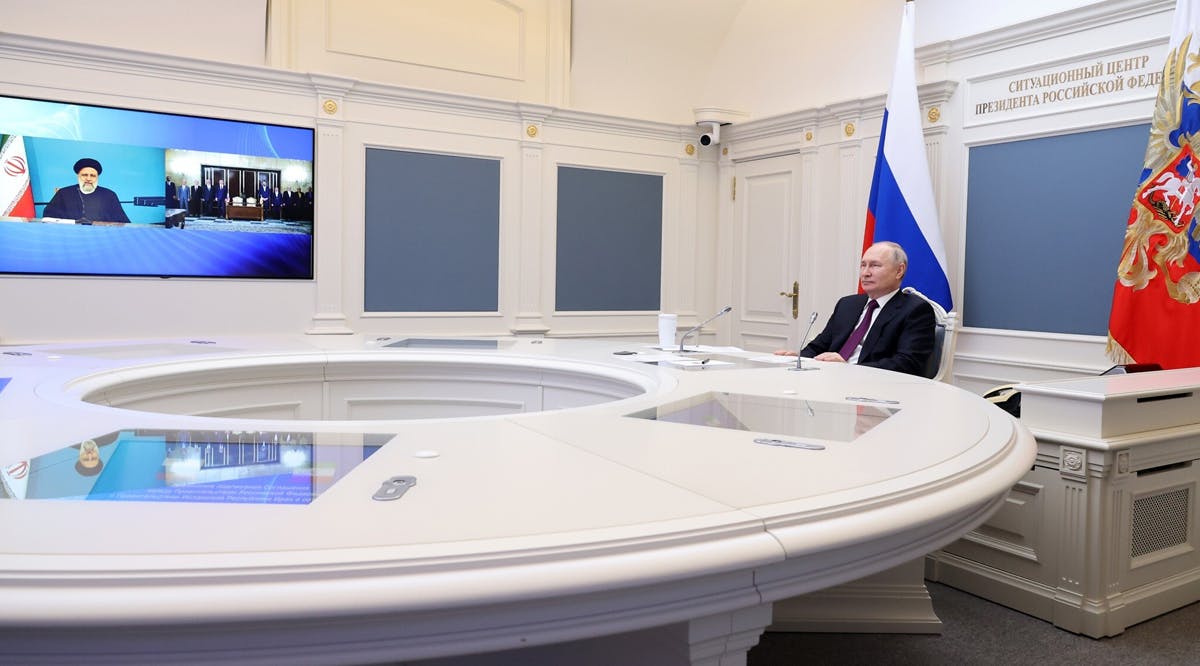 Russian President Vladimir Putin takes part in the ceremony of signing an agreement on the construction of the Rasht-Astara railway with Iranian President Ebrahim Raisi via videoconference at the Kremlin in Moscow, Russia