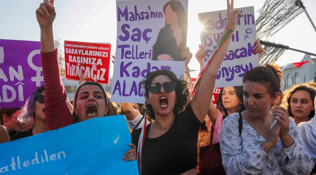 Women in Istanbul take part in a rally on the first anniversary of the death of Mahsa Amini, who died in the custody of Iran's morality police last year