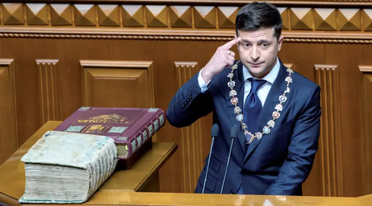 Ukraine President Volodymyr Zelensky takes the oath during his inauguration ceremony in parliament hall in Kiev