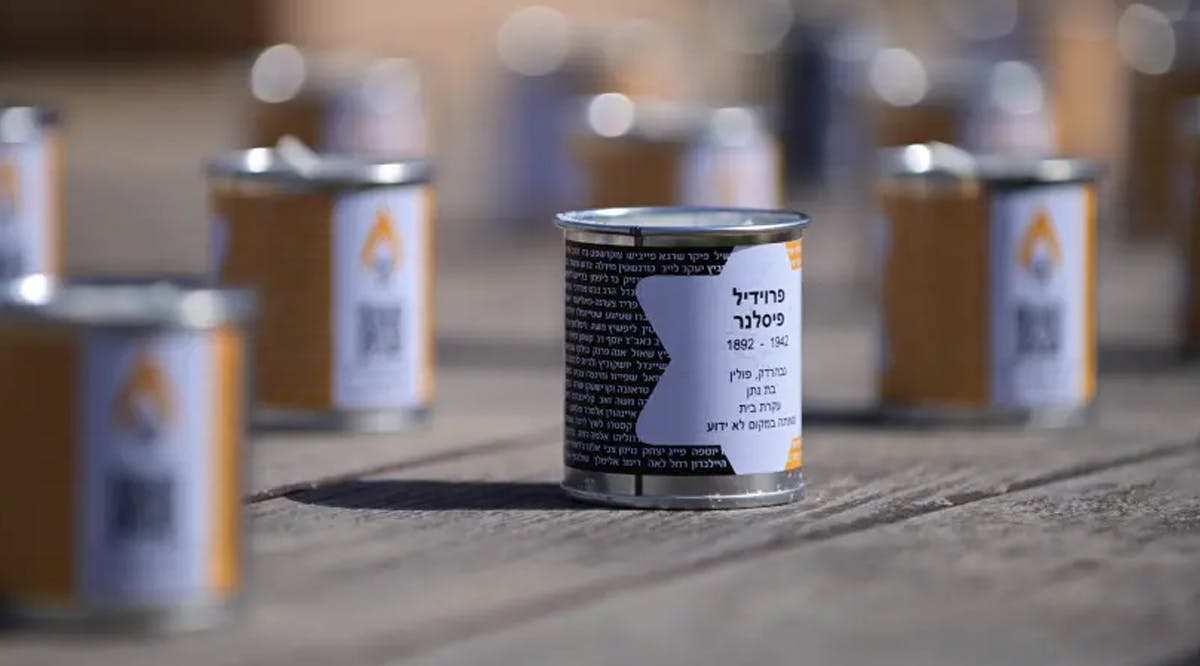 Yahrzeit candles with names of Holocaust victims are giving away to the public ahead of Holocaust Remembrance Day