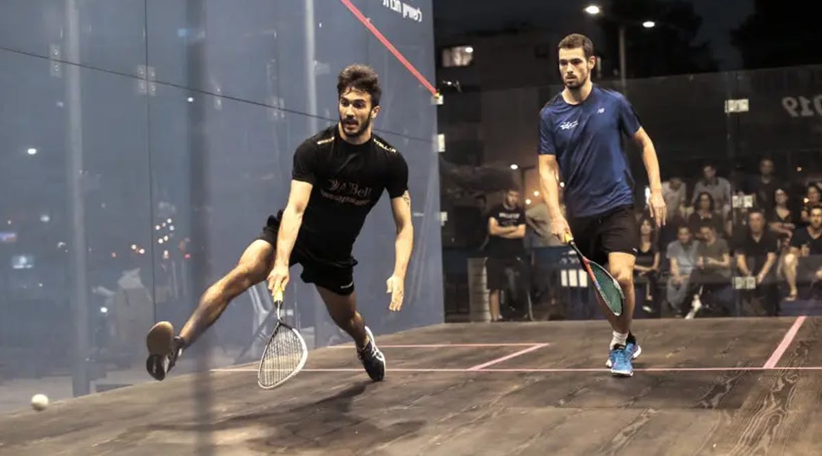 competitors take part in the professional squash tournament