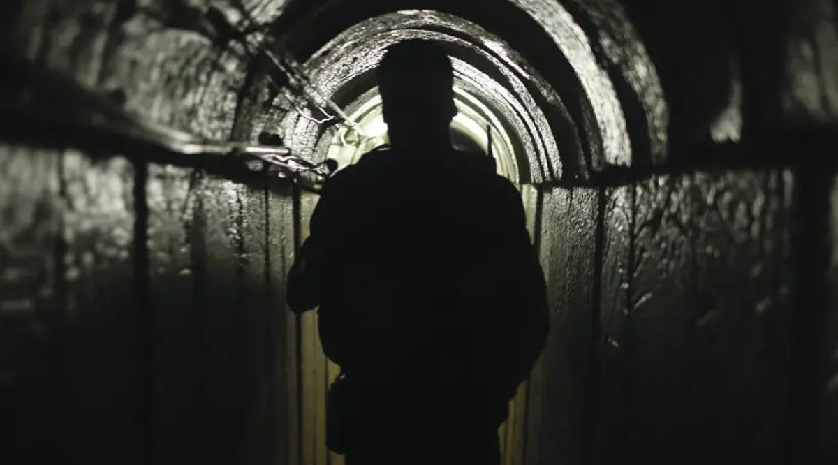 A fighter from the Izz el-Deen al-Qassam Brigades, Hamas’ armed wing, is seen inside an underground tunnel, in Gaza