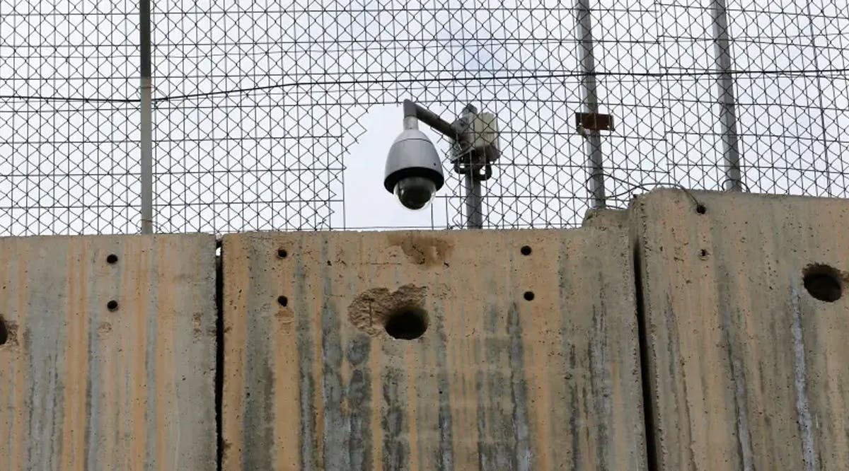 An Israeli security camera is seen on a section of the Israeli barrier in Bethlehem, in the West Bank