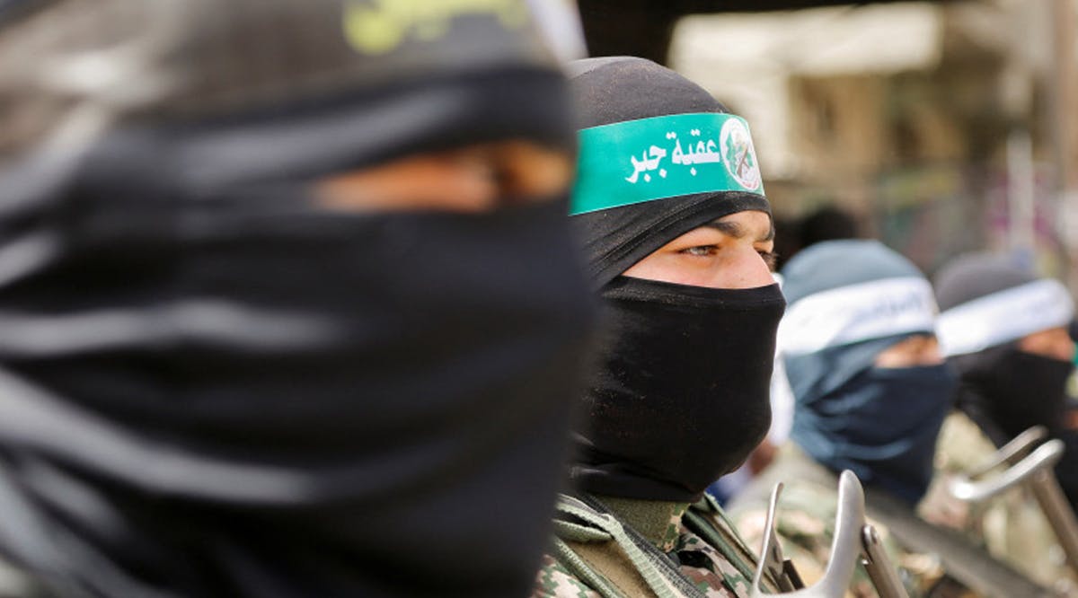 Palestinian militants attend Hamas rally Solidarity with Al-Aqsa in Jabalia, northern Gaza