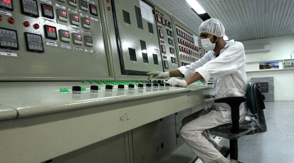 An Iranian technician works at the Uranium Conversion Facility just outside the city of Isfahan, Iran