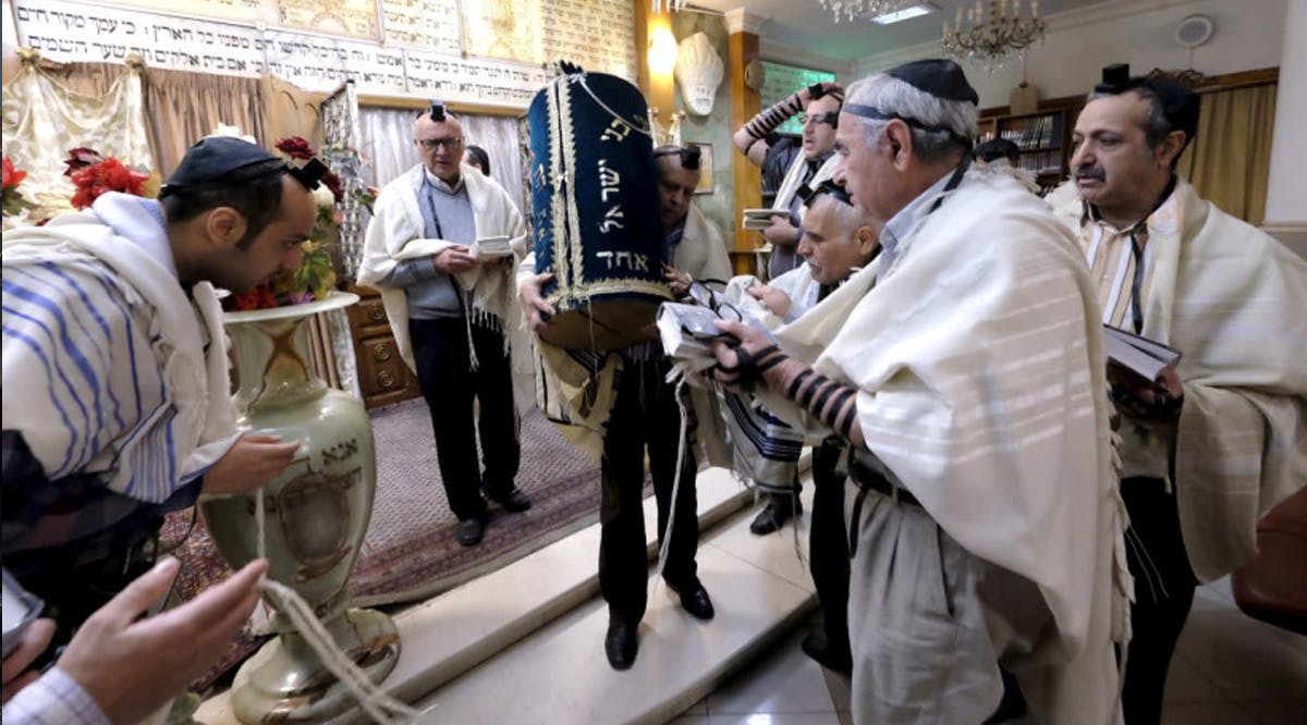 Iranian Jews pray at the Abrishami synagogue at Palestine street in Tehran