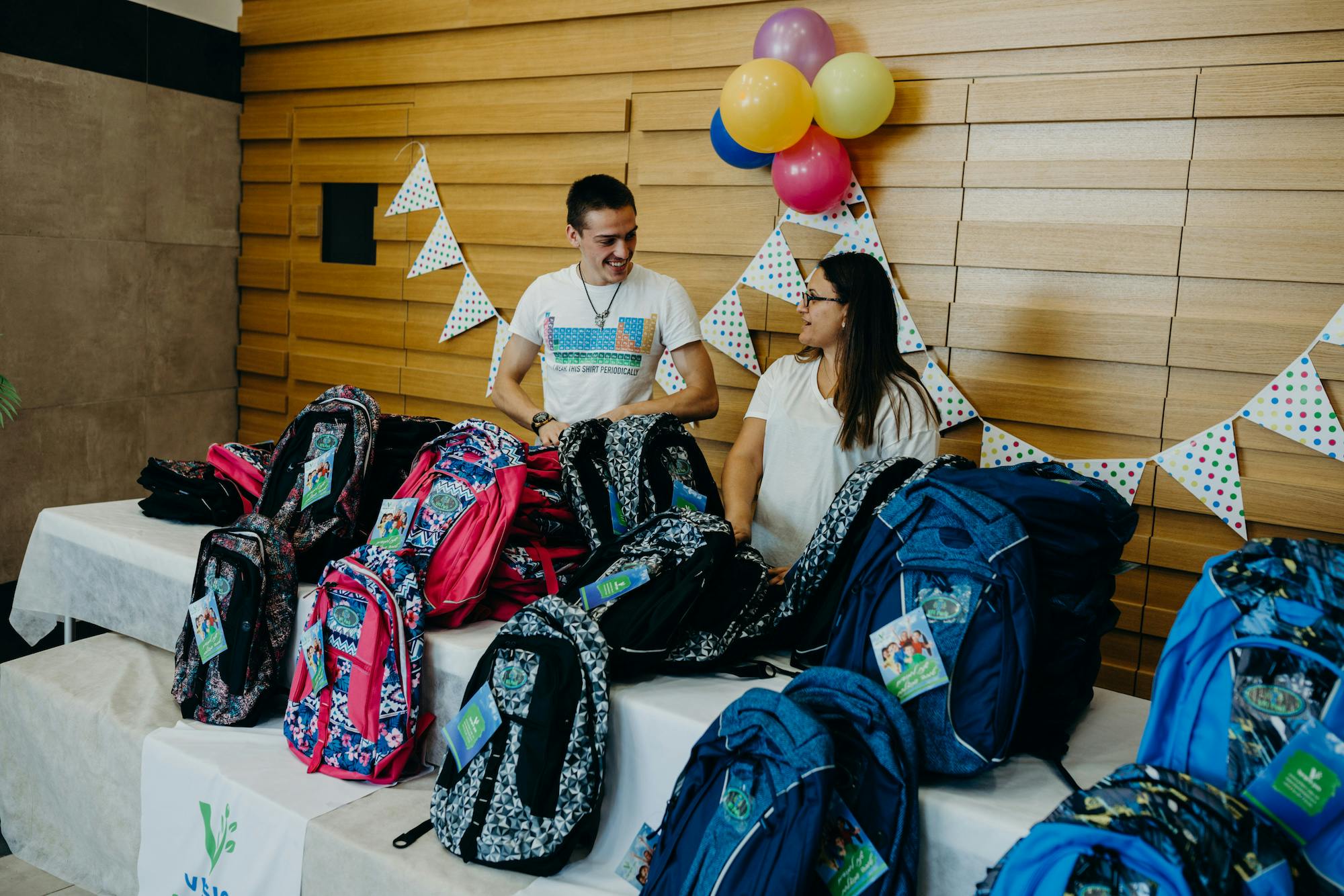 Distributing backpacks from the Millennium Centre