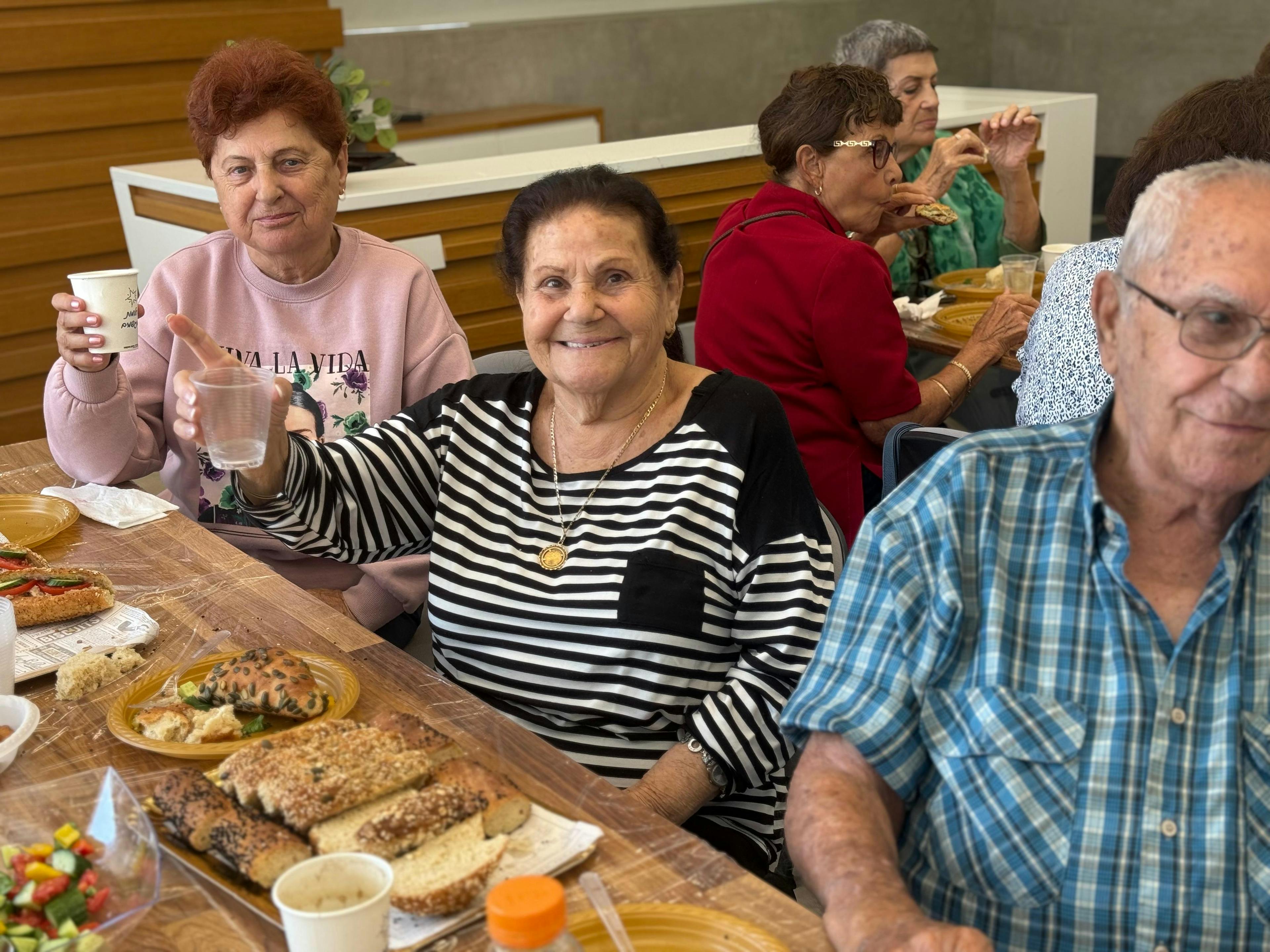 Gathering with Holocaust Survivors