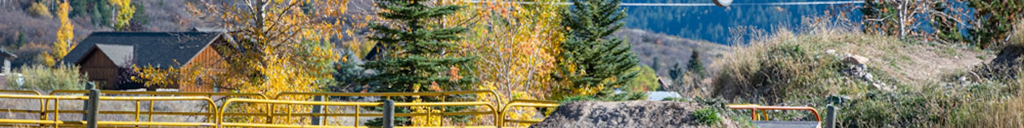 bike catching air on jump at Sherman Bike Park in Victor Idaho.