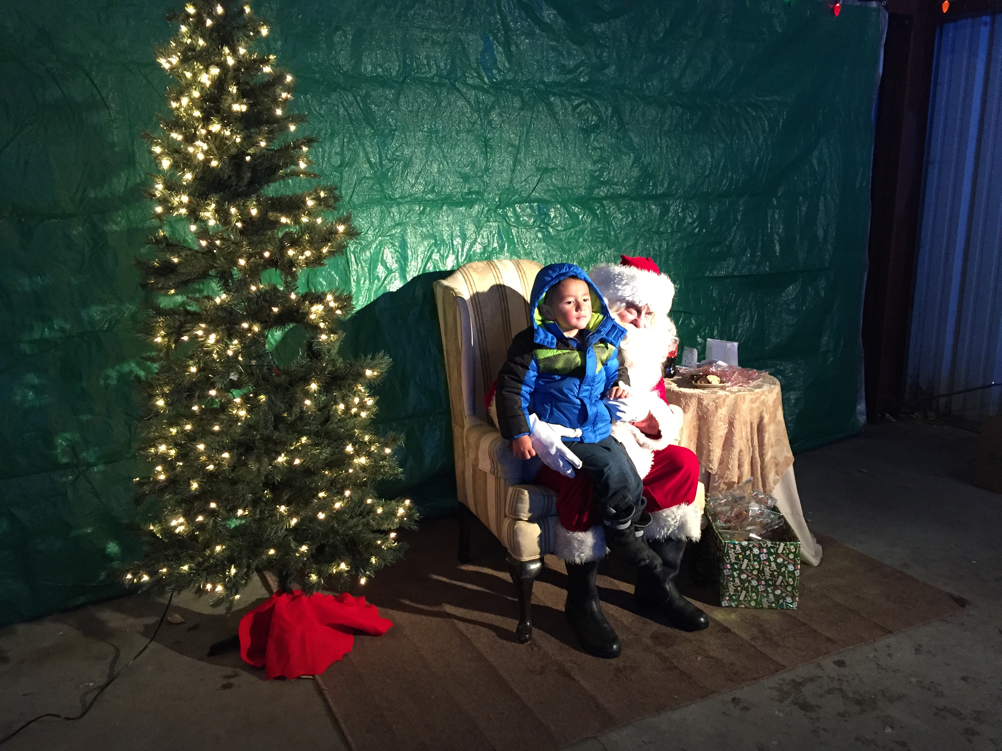 Boy on Santa Claus' lap