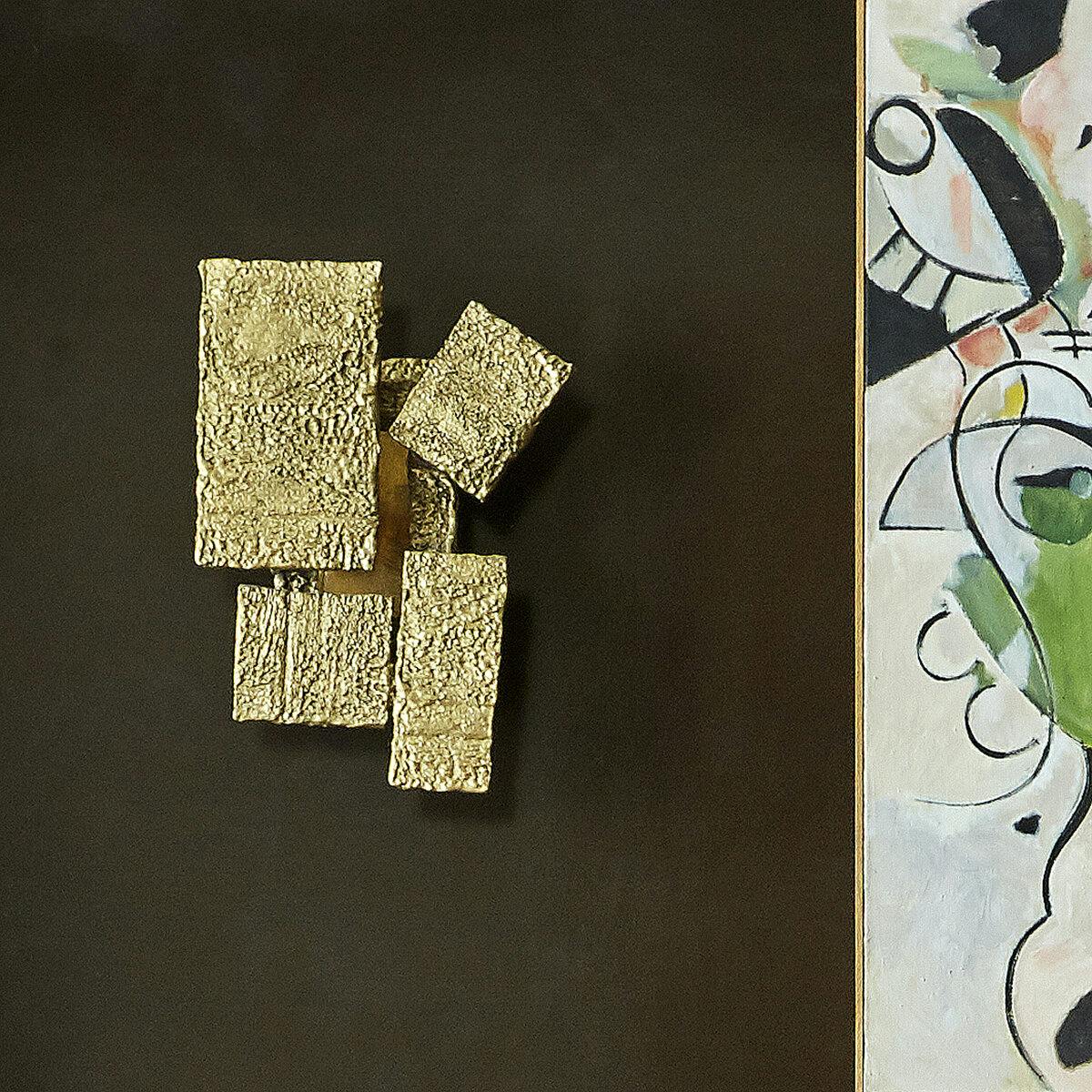 Quadravi Sconce on wall