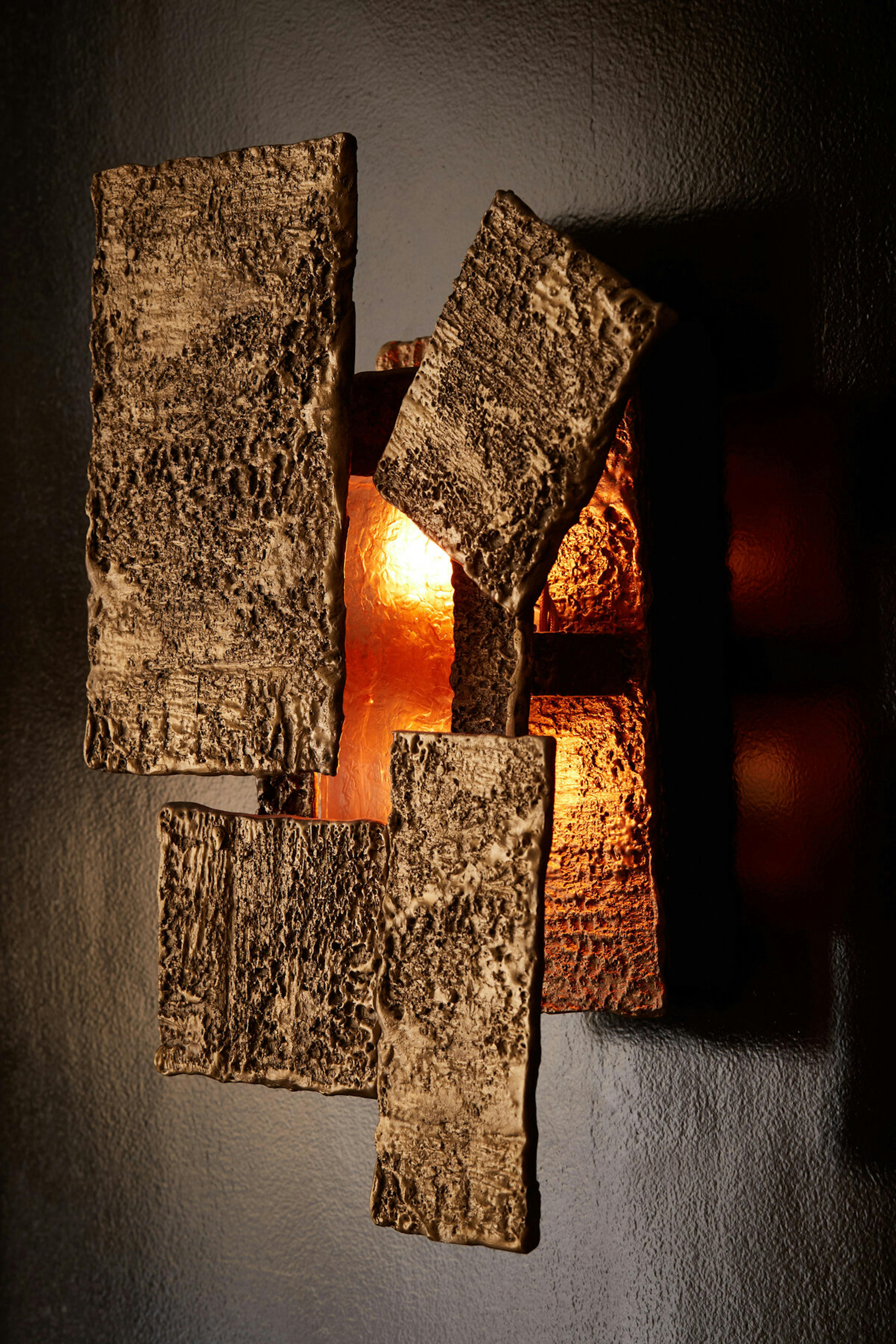 Quadravi Sconce on wall lit