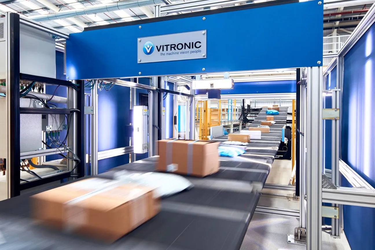 Packages moving through VITRONIC equipment tunnel