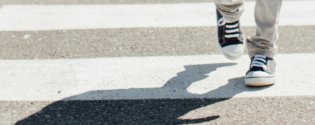 A child using a crosswalk.