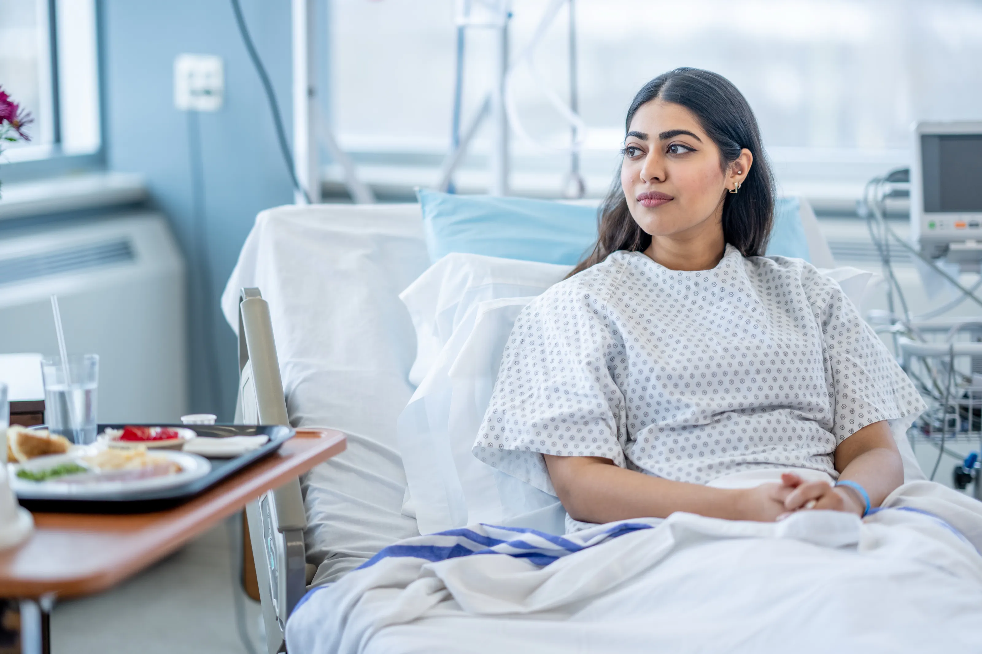 A patient resting in a hospital bed