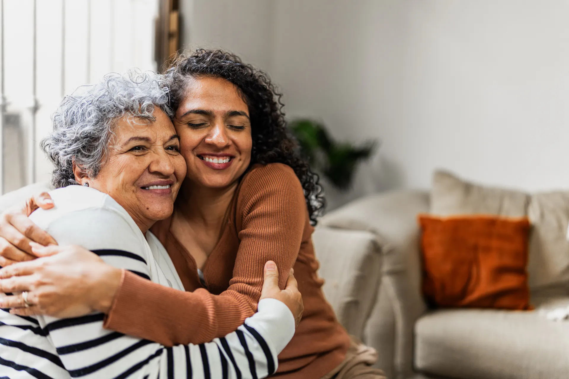 two woman hugging