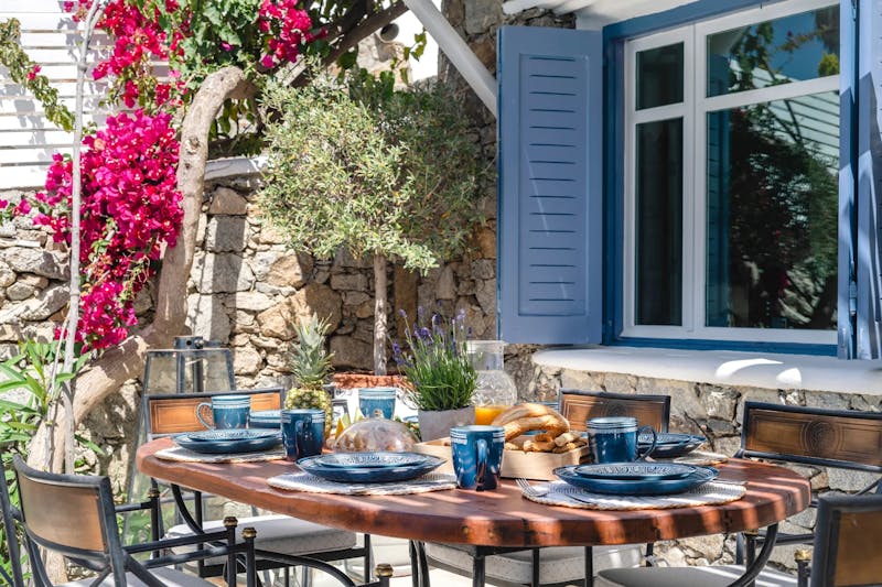 Outdoor Dinner area w pool & sea views