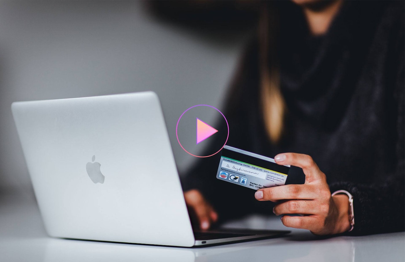 A woman who enters her bank details while shopping online