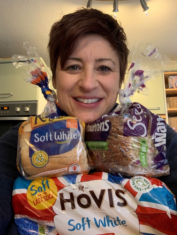 Woman posing with bread
