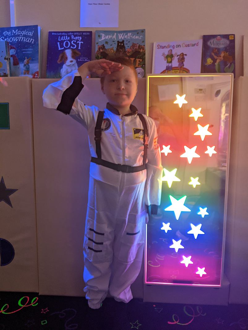 Nicholas wearing his spacesuit in our sensory room