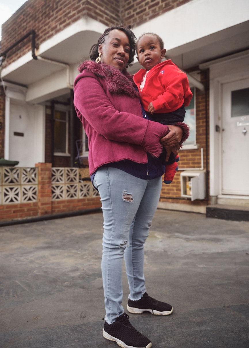 Adult holding toddler