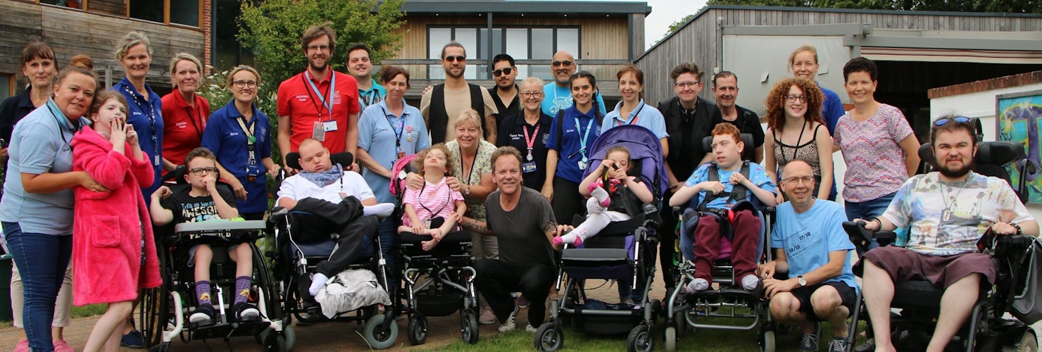 Group image of patients and staff at Naomi House & Jacksplace Hospice 