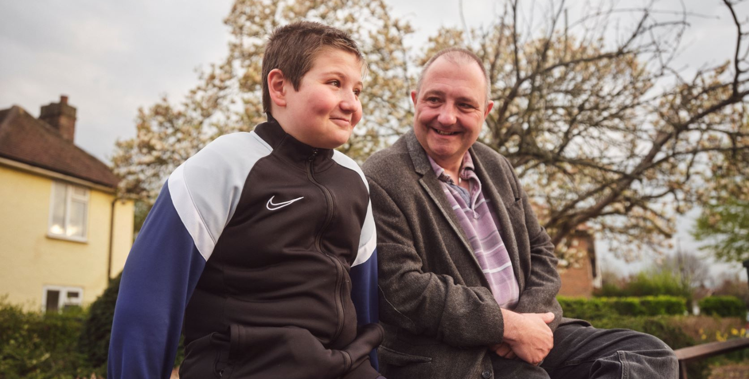 Older person smiling at child