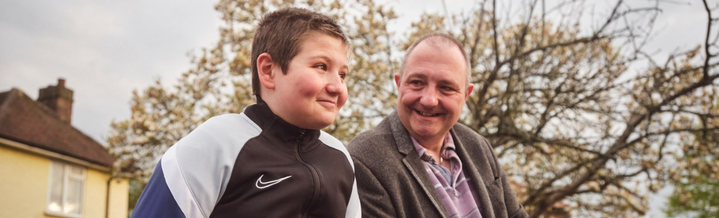 Older person smiling at child