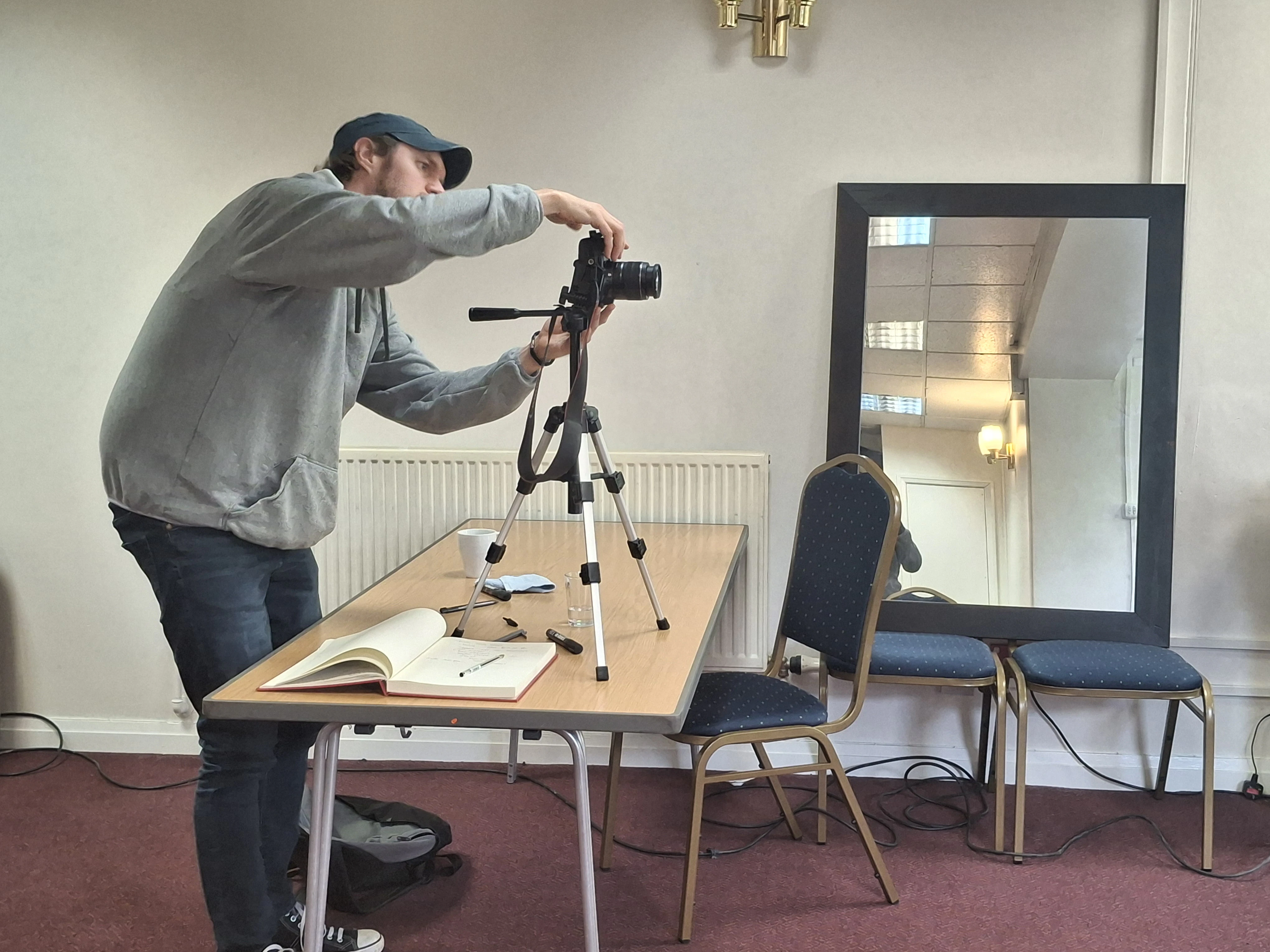 Artist Joseph Venning, setting up the scene.