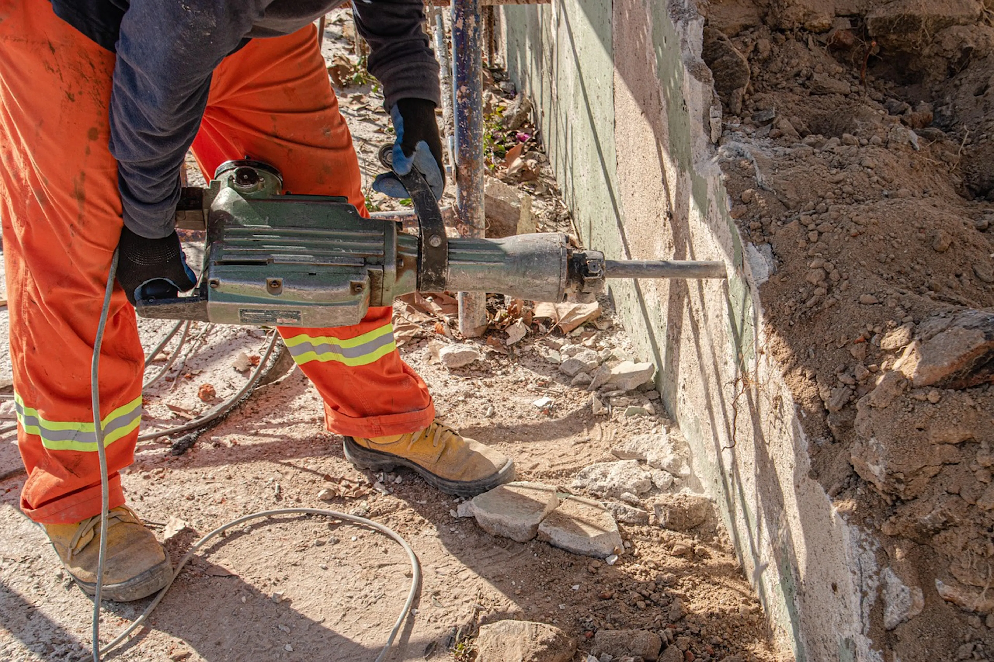 man working on a wall