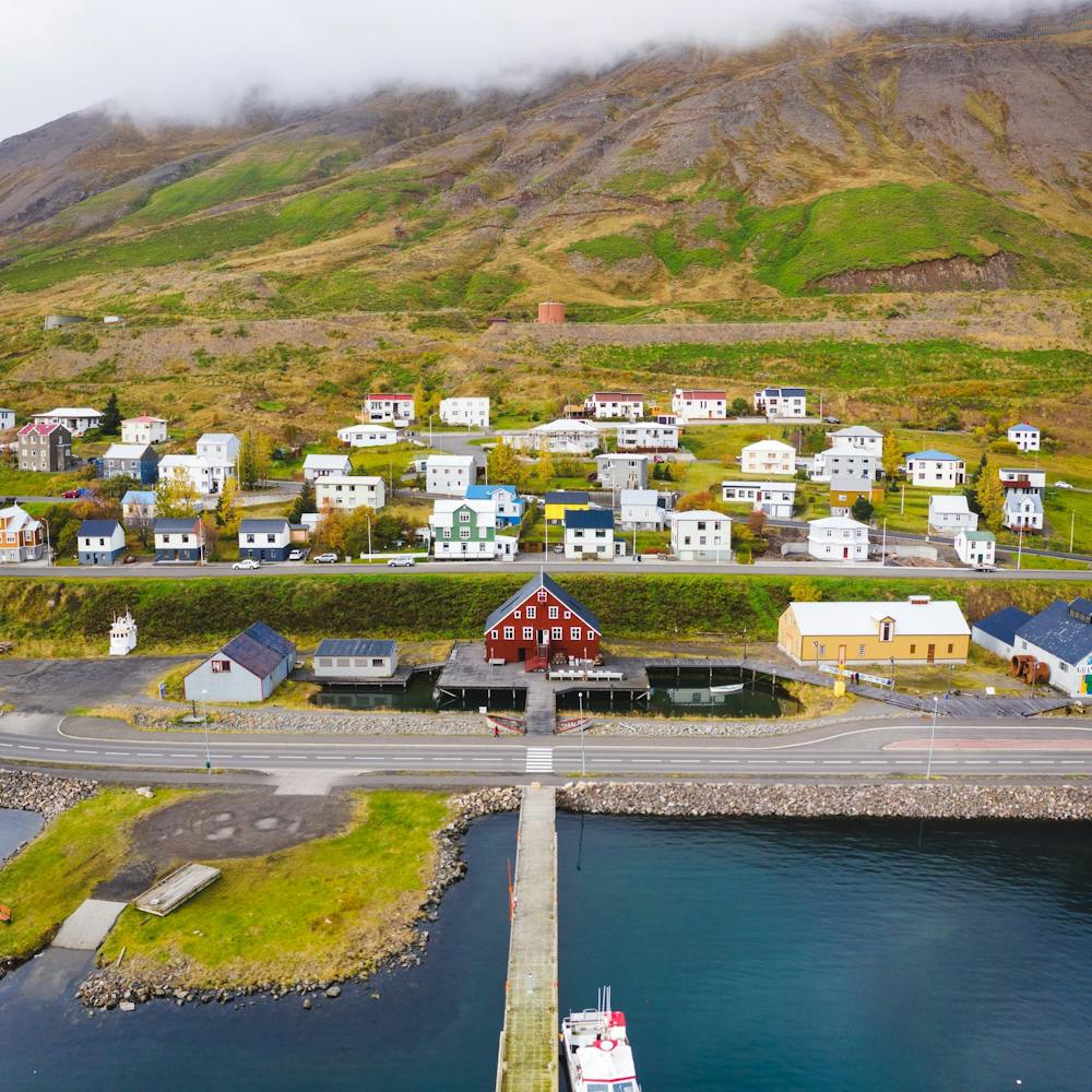 A panoramic view of the maritime museum in Siglufjörður showing part of the harbour, the museum komplex and few houses in the background
