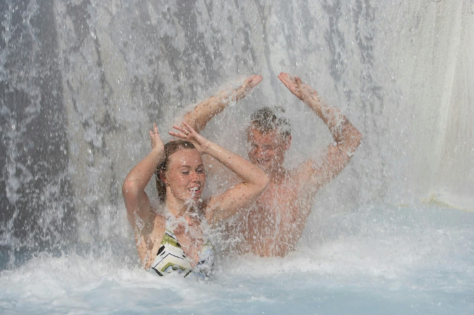 A couple enjoying geothermal bath together 