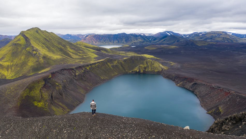 A man viewing a crater at Landmannalaugar