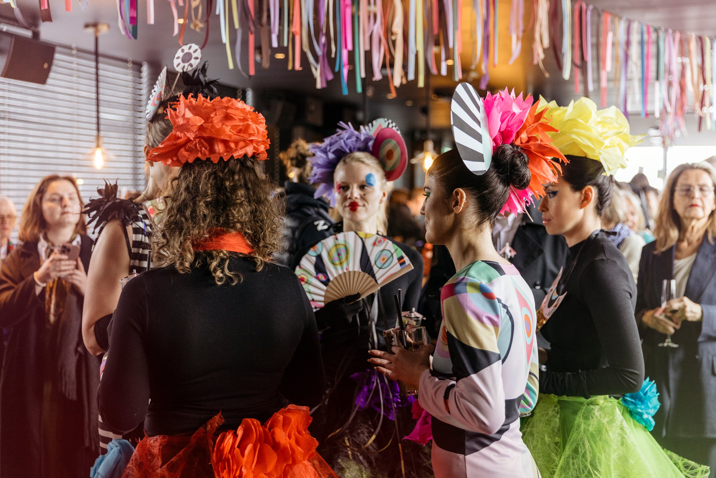 Colourfully dressed women at the Design March festival in Reykjavik