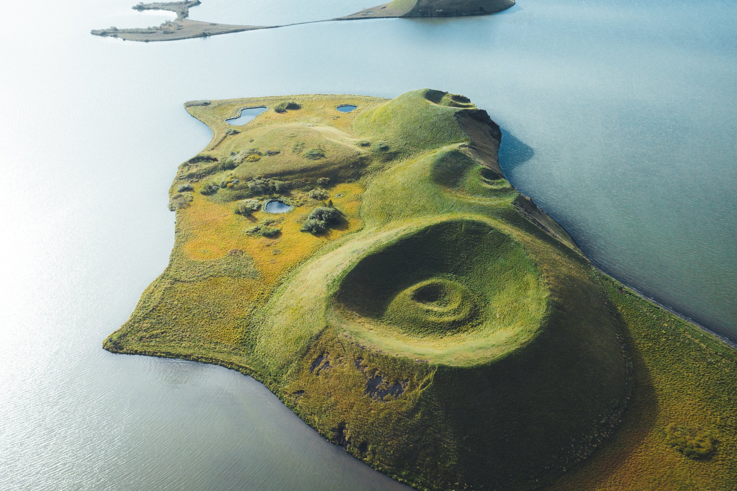 An island with green circle mounds