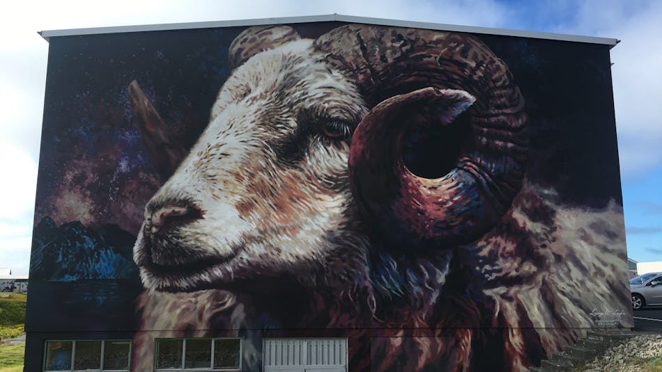 A mural of a rams head