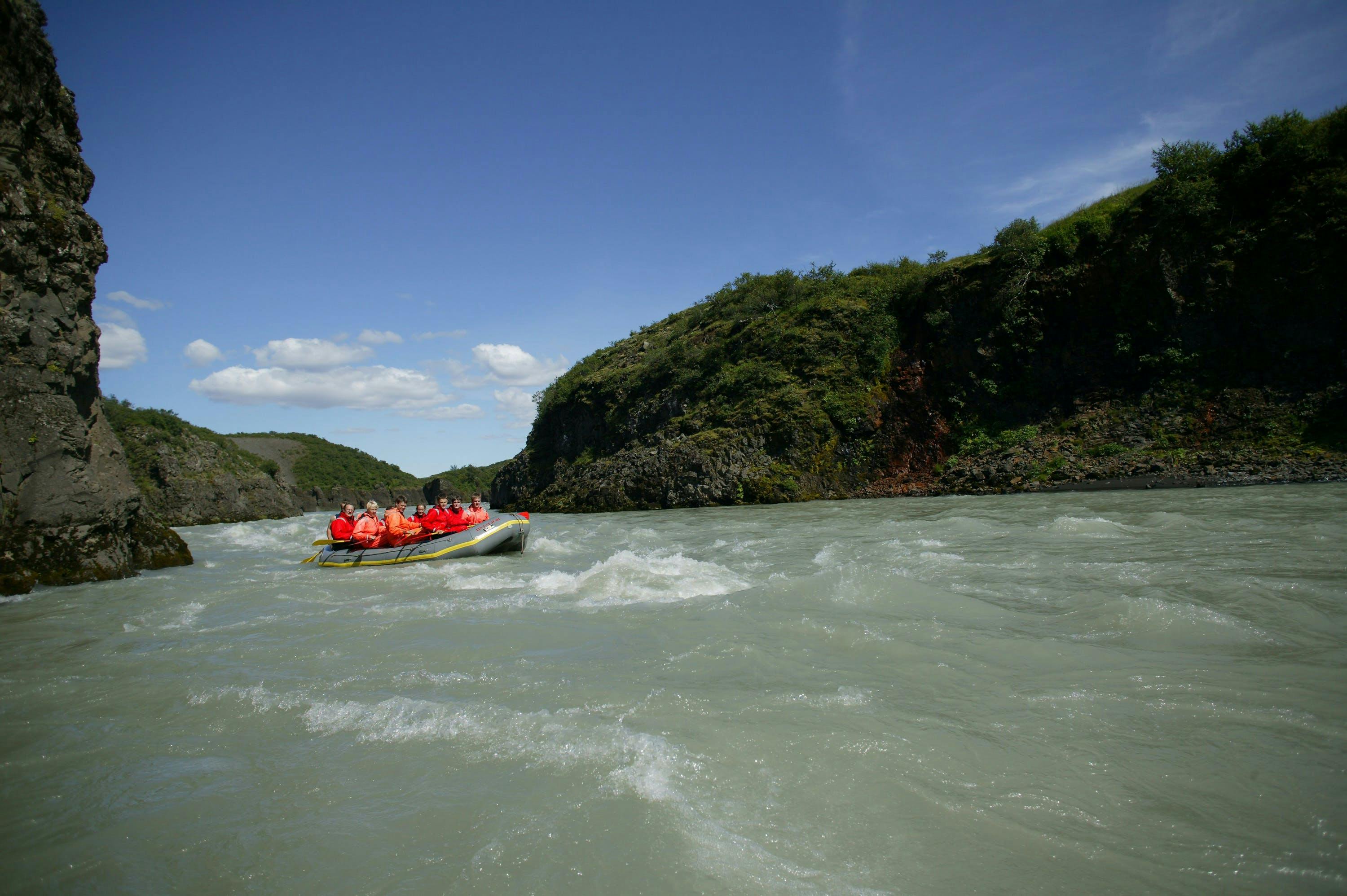 River rafting boat on glacial stream in Iceland