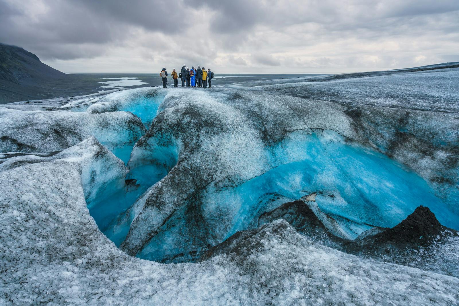 People walking on Vatnajokull glacier